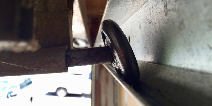 garage door wheel off track repair Palmdale